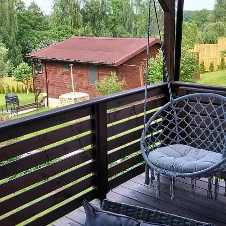 Деревянный коттедж Na Radosnej Nad Jeziorem Moldzie